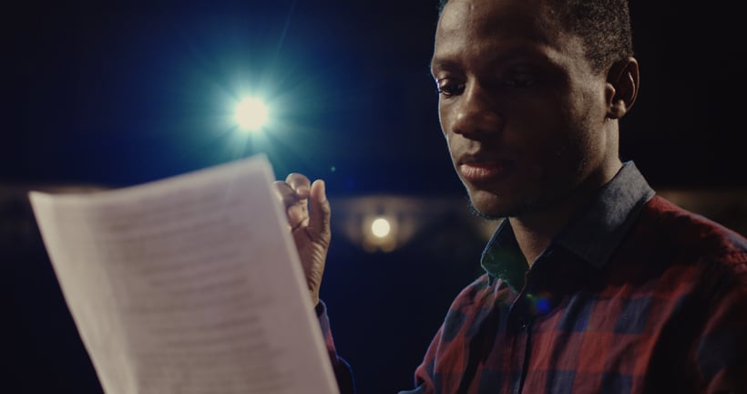 Actor performing a monologue in a theater